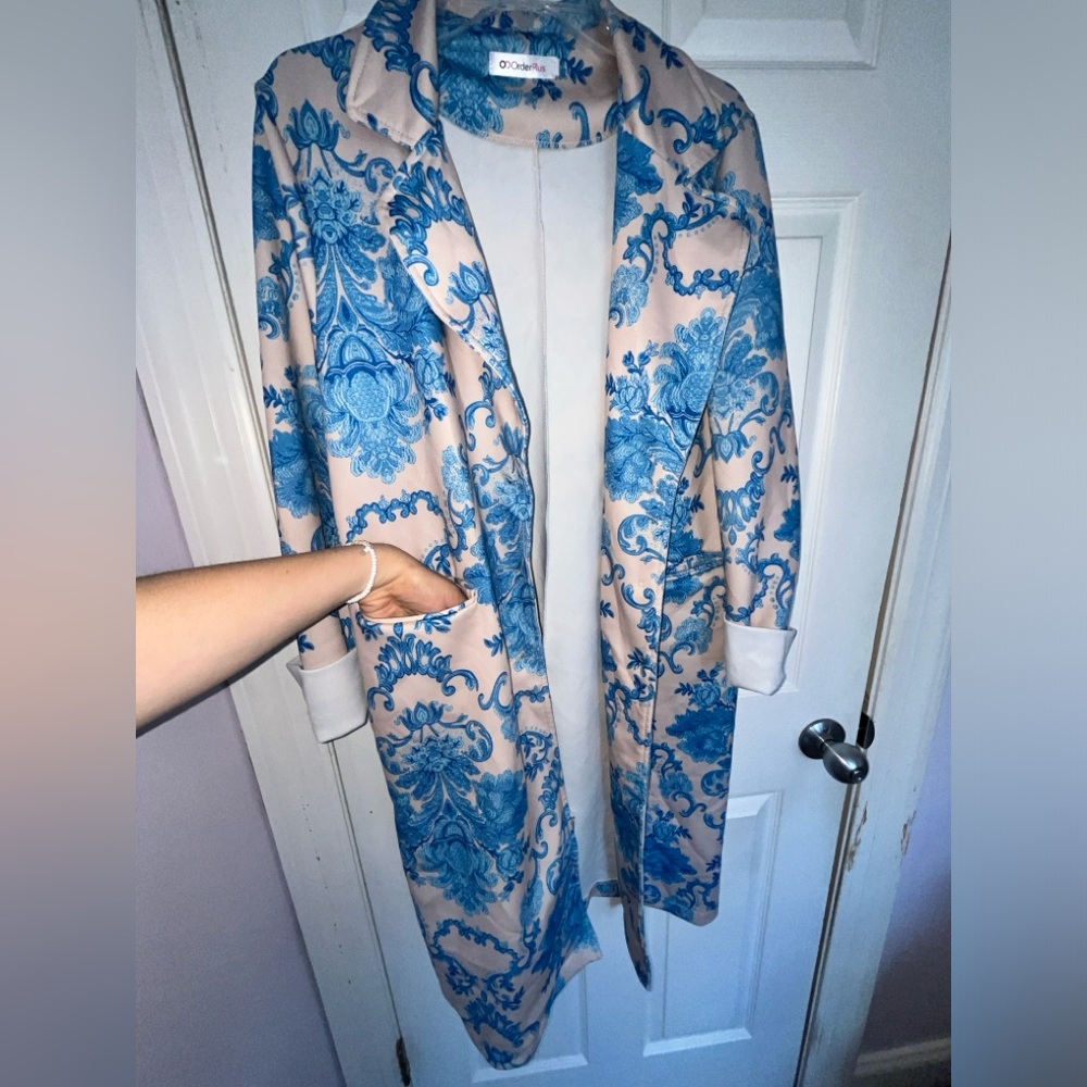 Light tan with beautiful blue design, never worn